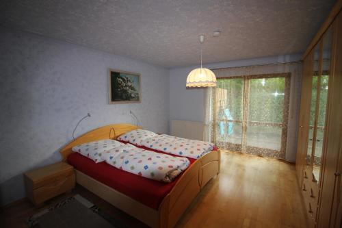Llit o llits en una habitació de Rötenbacher Wiesen