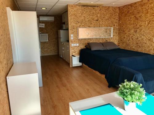 En eller flere senge i et værelse på Vistas al mar Canabal