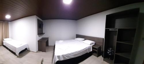Hotel ROFにあるベッド