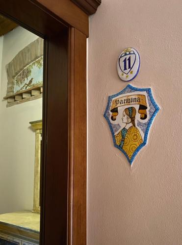 Πιστοποιητικό, βραβείο, πινακίδα ή έγγραφο που προβάλλεται στο Dama Estense