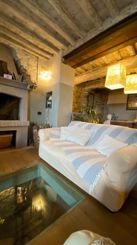 a bedroom with a bed and a swimming pool at Residenza Buggiano Antica B&B - Charme Apartment in Tuscany in Borgo a Buggiano