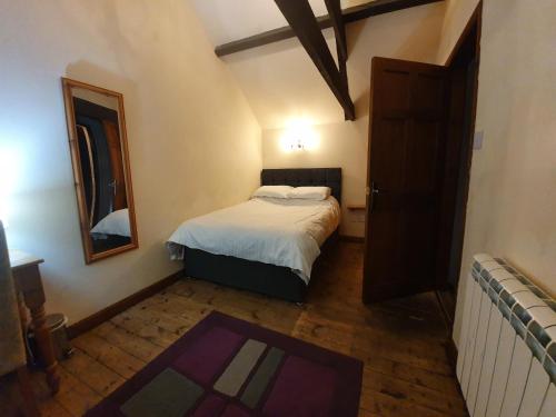 Postel nebo postele na pokoji v ubytování Tennyson Retreat