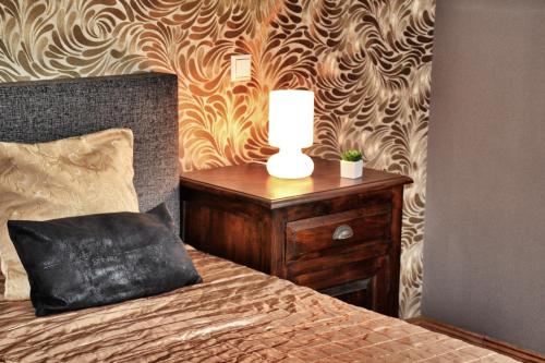 Ένα ή περισσότερα κρεβάτια σε δωμάτιο στο Apartments Fürstenvilla Putbus