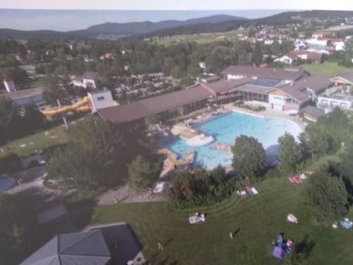 an overhead view of a large swimming pool at Wohnungen- Christopherhof MJ,Grafenwiesen in Grafenwiesen