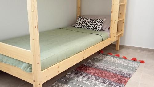Postel nebo postele na pokoji v ubytování ISALO Villa