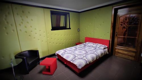 Voodi või voodid majutusasutuse Studio 5 toas