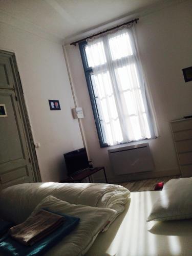 Postel nebo postele na pokoji v ubytování Les Ancres