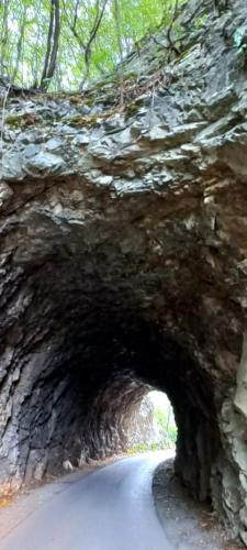 a tunnel on a road with a road at Vila Eva in Međuvršje