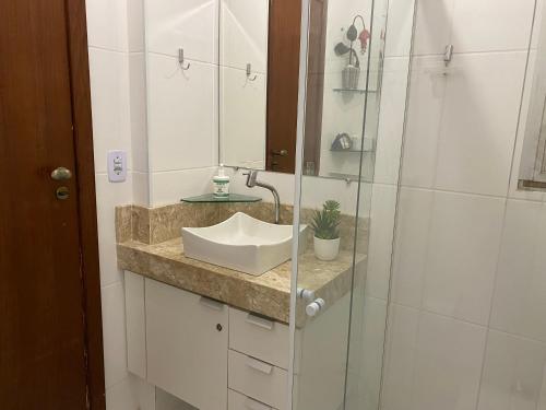 Ванная комната в Apartamento Mar da Praia da Costa