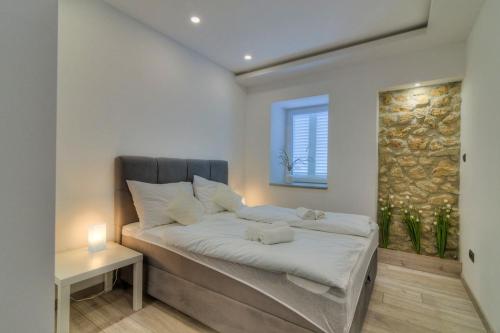 Ένα ή περισσότερα κρεβάτια σε δωμάτιο στο Holiday house Marea