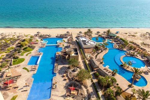 an aerial view of the water park at the beach at Encanto Living 1104 by Kivoya in Puerto Peñasco