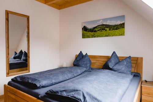 Postel nebo postele na pokoji v ubytování Holzerhof-Ferienwohnungen