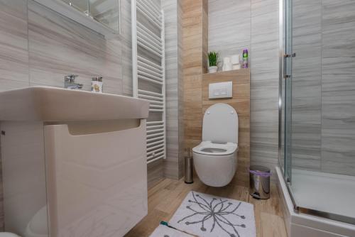 Koupelna v ubytování Elite One Premium Apartment
