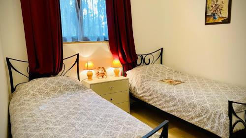 Posteľ alebo postele v izbe v ubytovaní Bilini Garden Apartment