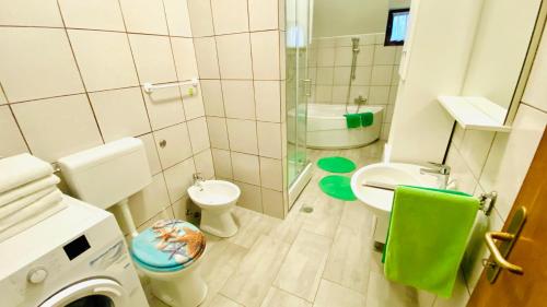 Kúpeľňa v ubytovaní Bilini Garden Apartment