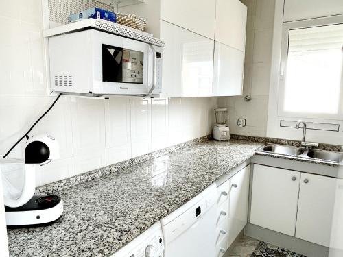 Dapur atau dapur kecil di Open Sky, Apartamento con solárium privado y barbacoa