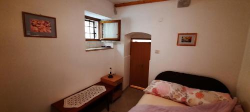 A bed or beds in a room at Apartment Lucija