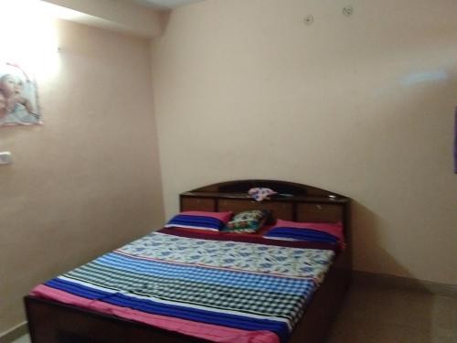 Cama ou camas em um quarto em Prem Home Stay