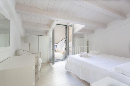 Llit o llits en una habitació de "Le Casette di Ninetta" - Casa vacanza Casmene
