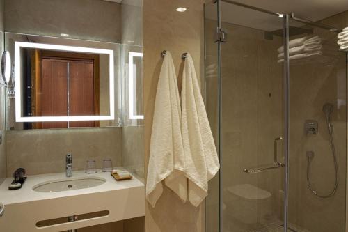 Koupelna v ubytování Amare Hotel