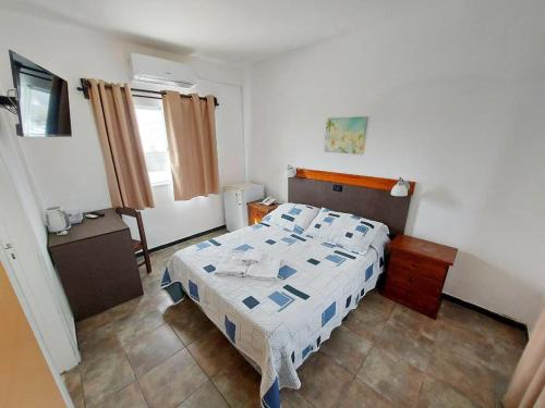 Postel nebo postele na pokoji v ubytování Hotel Mesón Do Vento