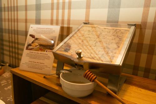 a mortar and pestle on a table with a bowl at Il Podere Del Germano Reale in Coriano