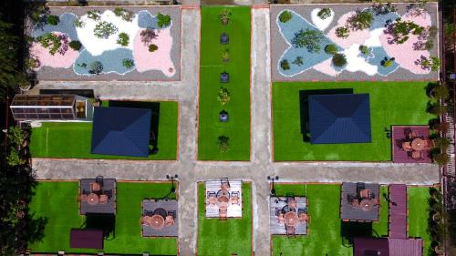 an overhead view of a yard with houses at Qingjing Baiyun Resort in Renai