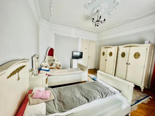 Кровать или кровати в номере Mosaico Alfetta Hostel