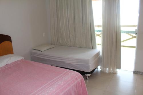 Ліжко або ліжка в номері Villa das Águas-reservas