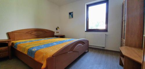 Postel nebo postele na pokoji v ubytování Apartmány Adieu