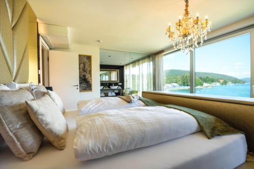 Ένα ή περισσότερα κρεβάτια σε δωμάτιο στο Luxury Living - Luxus Appartements in Velden