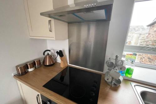 Η κουζίνα ή μικρή κουζίνα στο Rosevale Apartment