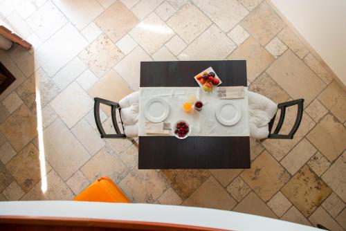 an overhead view of a table with food on it at Monteforte Resort in Ugento