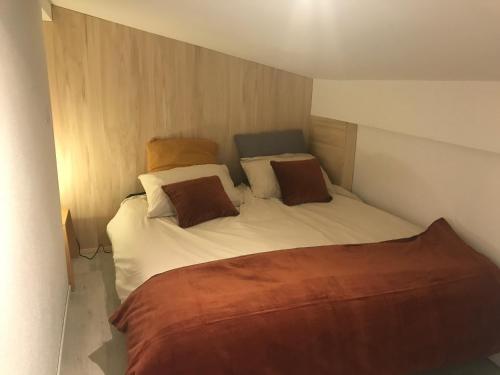 Katil atau katil-katil dalam bilik di Ecolodge Appartements 2 pièces cosy gare