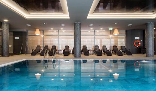 Bazén v ubytování UPA Medical SPA nebo v jeho okolí