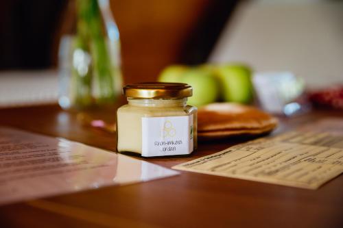 a jar of soy sauce sitting on a table at Himmelhäuschen in Bischofsheim an der Rhön