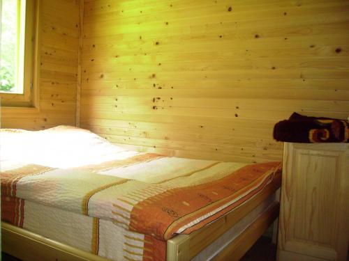 מיטה או מיטות בחדר ב-Eko Oaza-Tear of Europe