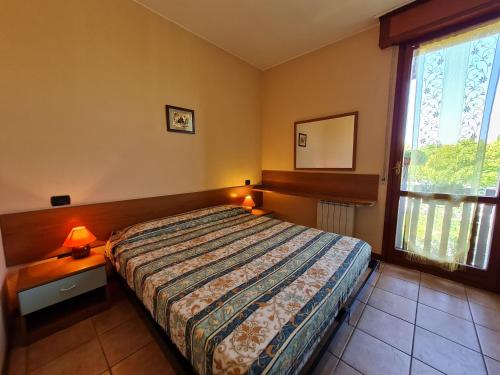 Cama o camas de una habitación en Easy Apartments Peschiera