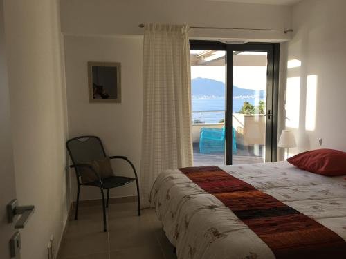 Postel nebo postele na pokoji v ubytování VUE MAGNIFIQUE SUR BAIE AJACCIO