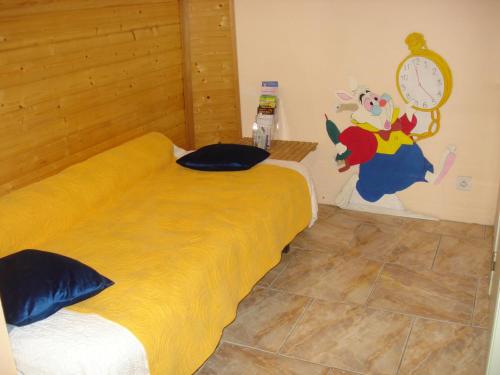 Ένα ή περισσότερα κρεβάτια σε δωμάτιο στο Chambre d'hotes La Source Aveyron
