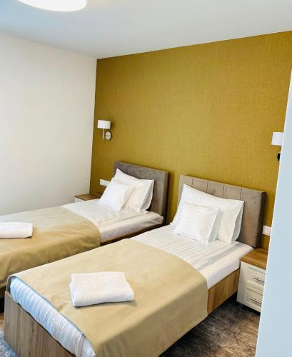 Ένα ή περισσότερα κρεβάτια σε δωμάτιο στο Hotel River