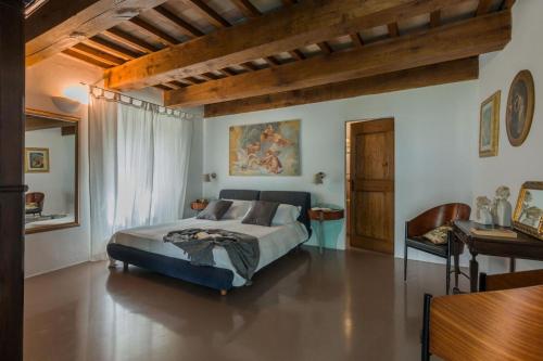 מיטה או מיטות בחדר ב-Villa Sabrina 12