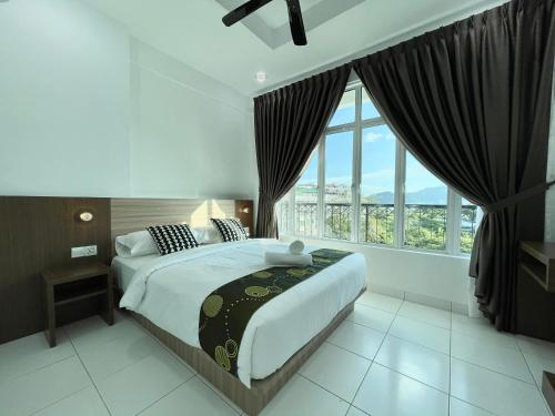 Postel nebo postele na pokoji v ubytování Century Suria Aparment Langkawi by Zervin