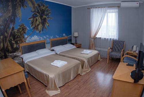 Кровать или кровати в номере Гостиничный комплекс Бумеранг