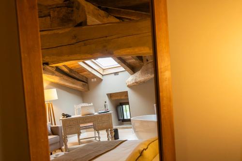 a view of a room with a desk and a window at Hotel Palacio De Luko in Luco
