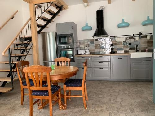 Kuchyň nebo kuchyňský kout v ubytování Viki Apartmanház