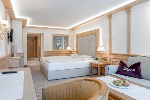 Postel nebo postele na pokoji v ubytování Hotel Bellevue - 4 Sterne superior