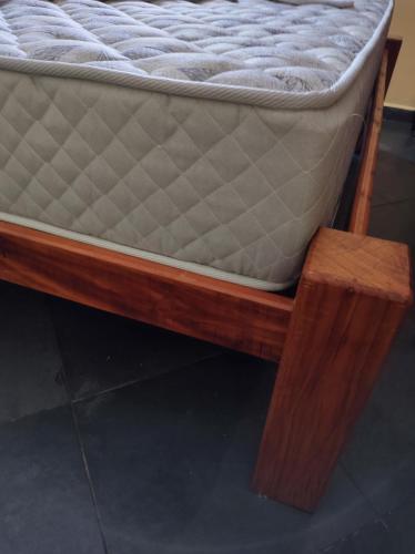 Voodi või voodid majutusasutuse Casa com piscina e Wi-fi UBATUBA toas