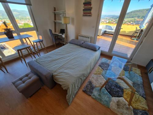 Postel nebo postele na pokoji v ubytování Luminoso apartamento con gran terraza