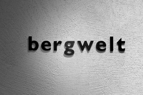 a sign on a wall with the word berkeley at Hotel & Appartements Alpenresidenz Viktoria in Neustift im Stubaital